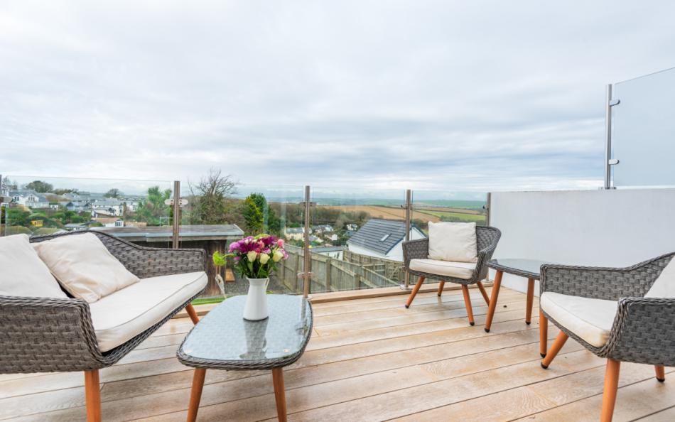 decked area with furniture
