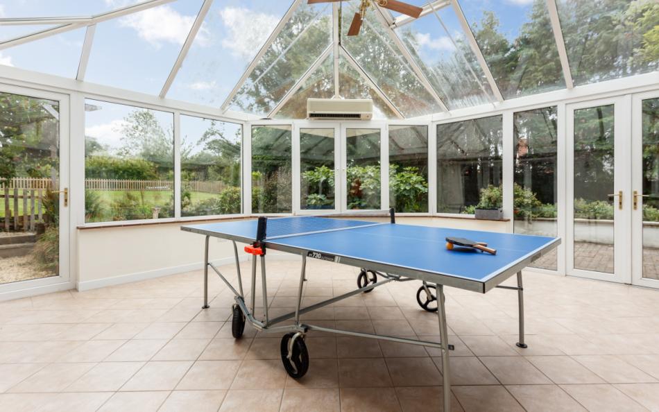 table tennis in the conservatory at Thatchby Oak