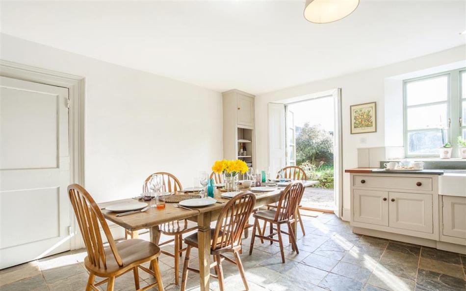 Dining area, with french windows to the garden at Higher Sutton