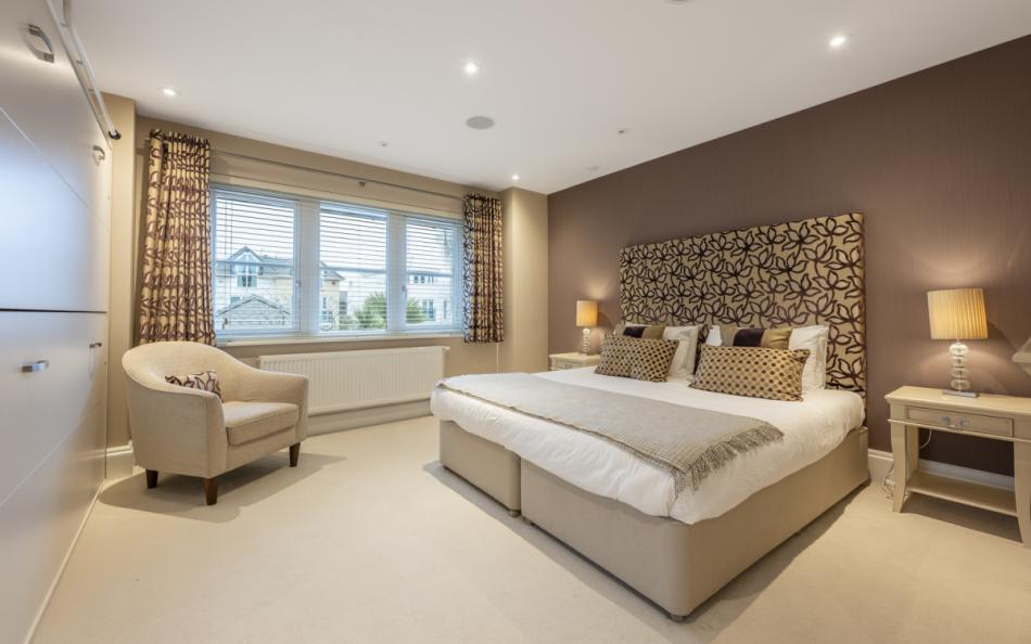 Double bed at Grasmere Beach House