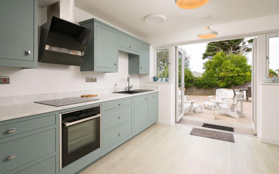 Modern kitchen with doors to outside at Osprey 