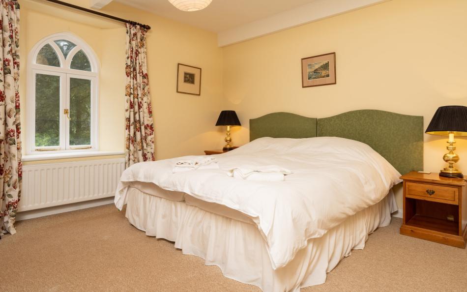 Bedroom two at Holne Chase Carriage House