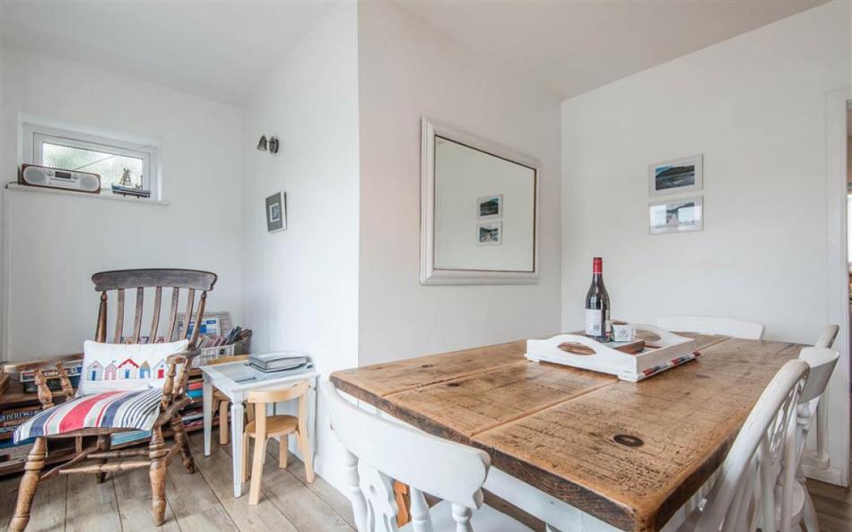 The dining area, with doors to the balcony at The Haven 