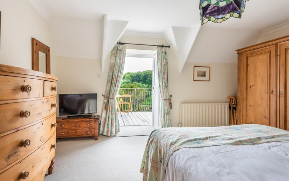 double bedroom to balcony at Captain's View, 3 Sandhills
