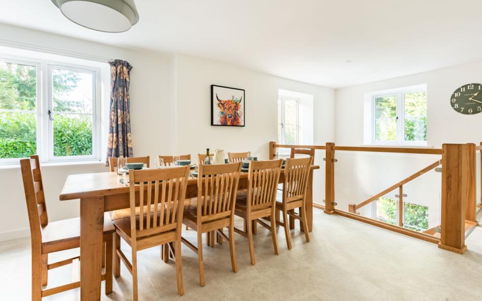 Dining table in the open plan kitchen diner at Clanacombe Lodge 