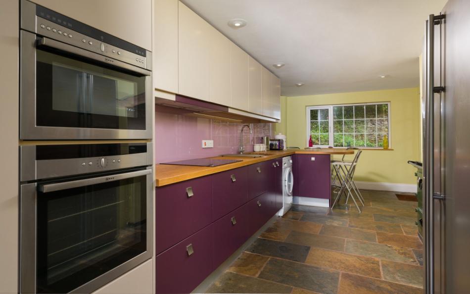 View of the kitchen with Rayburn cooking range at Coombe Park