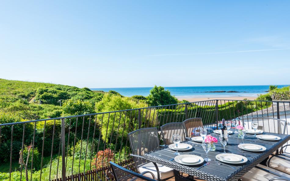 The patio with beach views at Pond House 