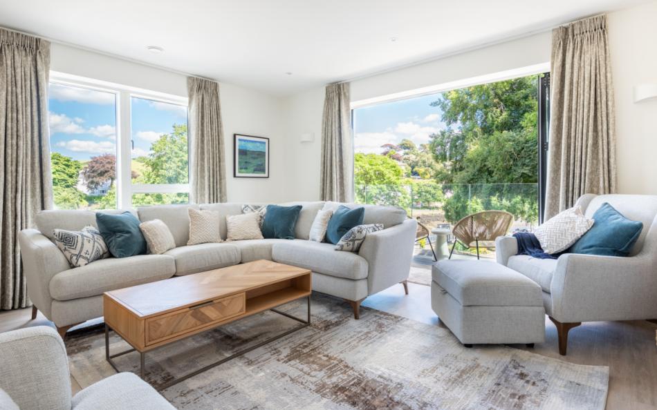 First floor living room in Larkrise with balcony