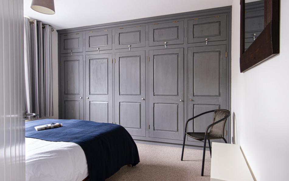 King bedroom with stylish decor at The Courtyard