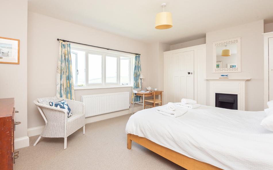 The spacious master bedroom with estuary views at Arran 