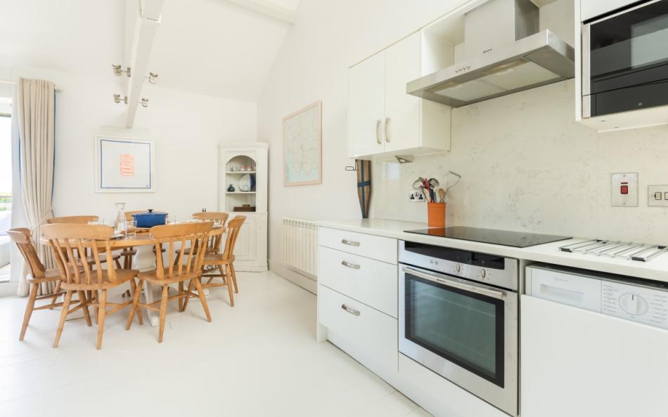 The kitchen and dining area at Court Barton Loft