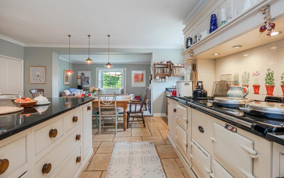 The kitchen looking across to the dining space and living area at Dunstone Farm