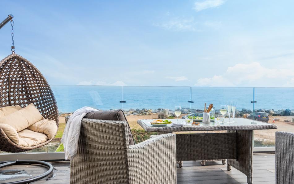 Panoramic sea views form the balcony at The Crab Pot