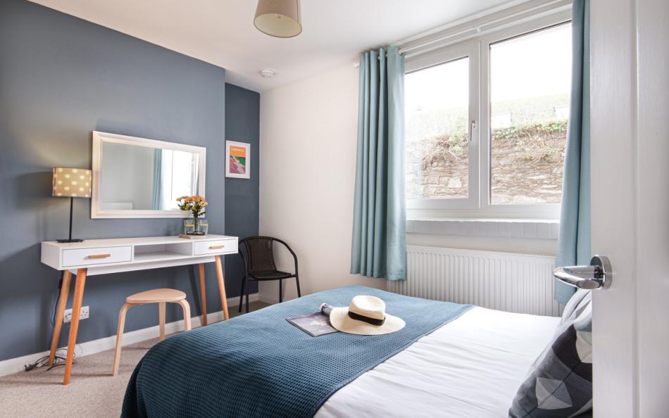 Double bedroom with large window at The Courtyard