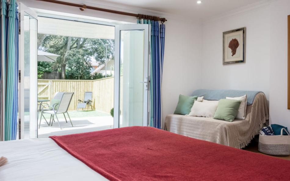 double bedroom with balcony access