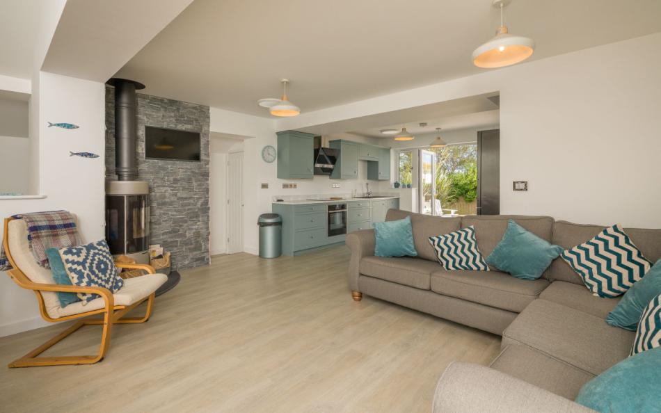The very attractive lounge with log burner at Osprey 