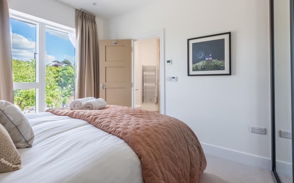 Larkrise, bedroom 3 with estuary views and en suite shower room