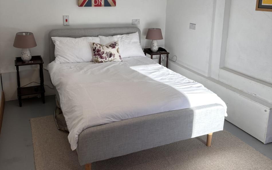 Bedroom 5 with 4'6 bed (located off the kitchen) at Landgreek Barn