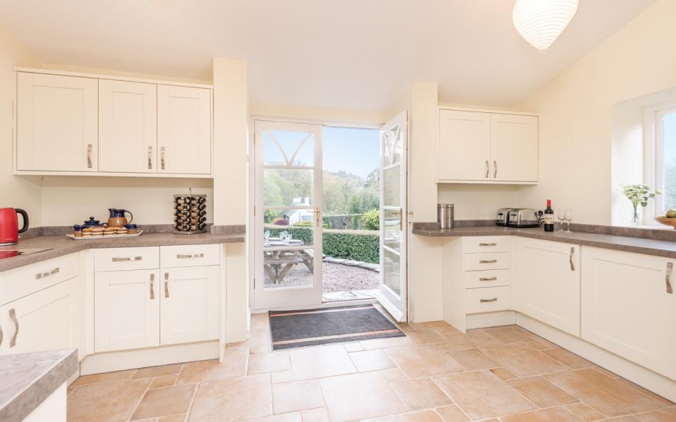 The lovely modern kitchen at Holne Chase Carriage House