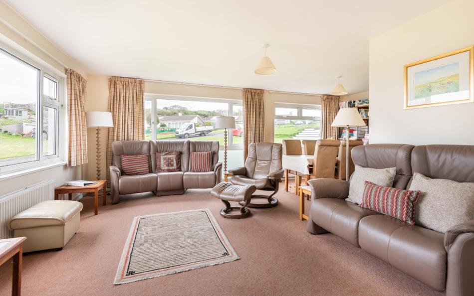 The spacious lounge at Devon House 