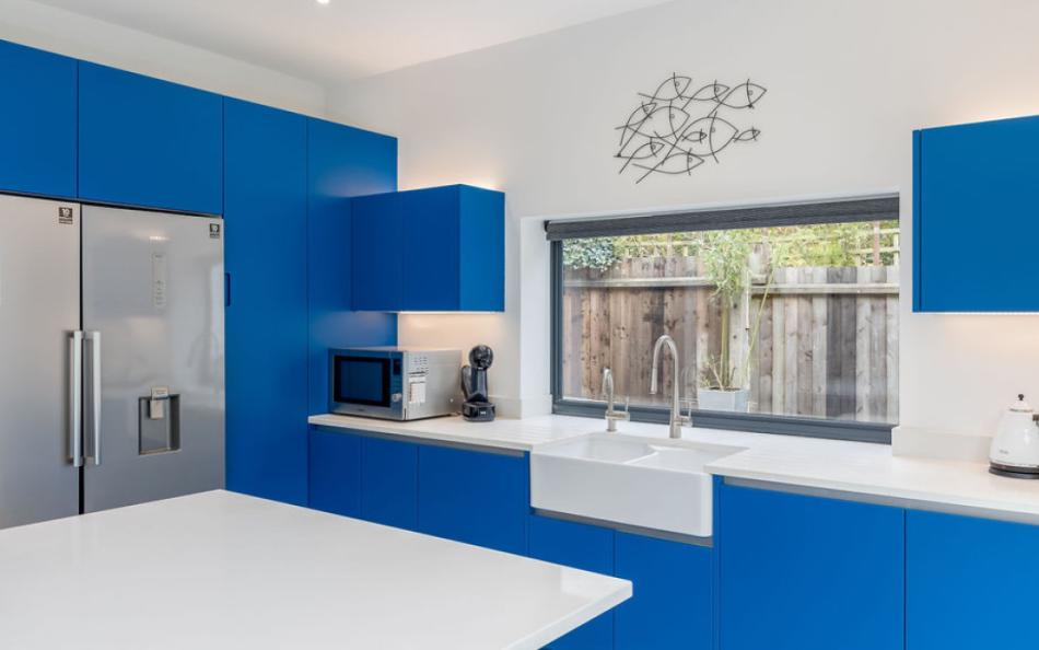 modern kitchen with american fridge freezer at 21W sandbanks