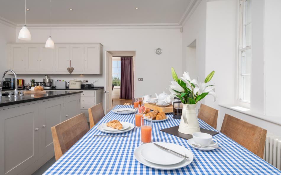 The breakfast table in the kitchen at Holset House