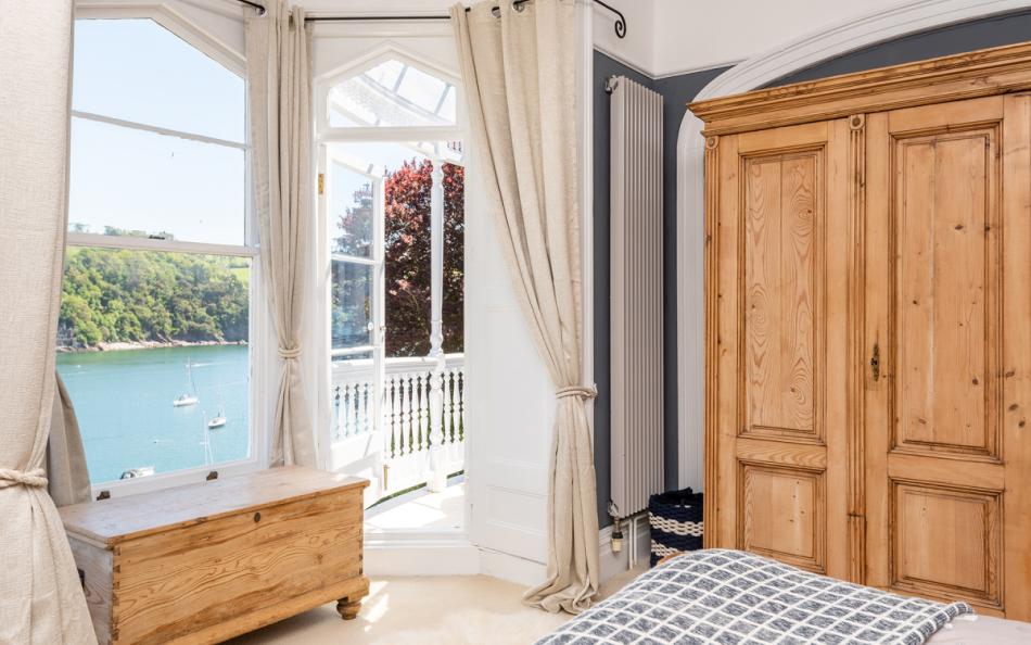 Large bay window in the master bedroom with excellent river views at Halcyon House