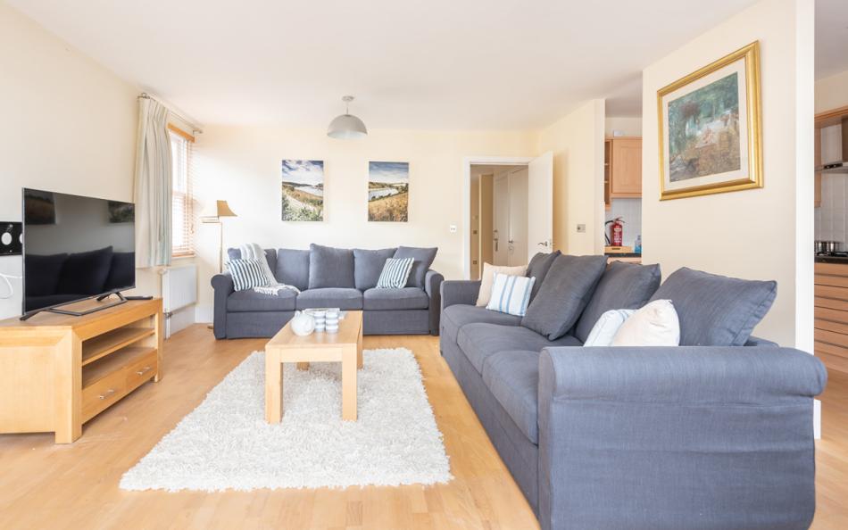 Sitting room with large Smart TV at 11 Combehaven 