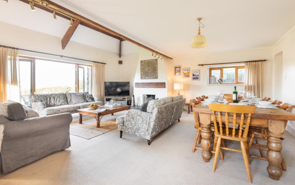 Spacious sitting and dining room at Blackness Barn