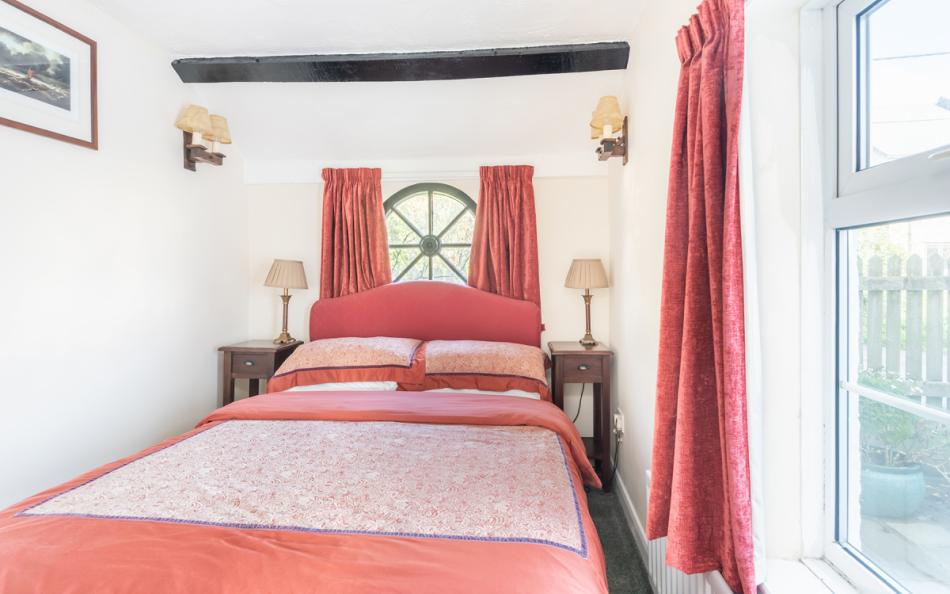 Downstairs bedroom at Clovelly Cottage