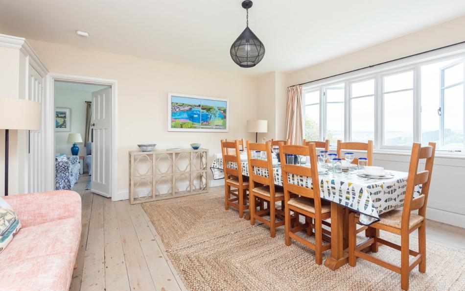 The pretty dining room looks out over the water at Arran 