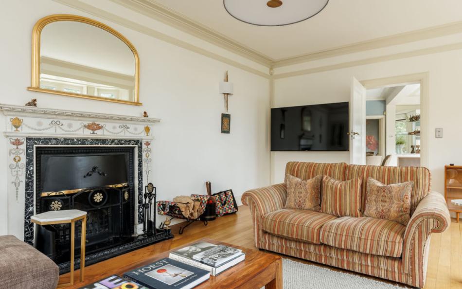 living room with fire at Panorama House near Bournemouth