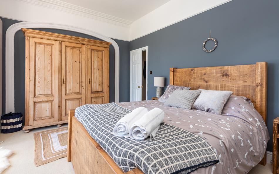 Tastefully furnished master bedroom at Halcyon House