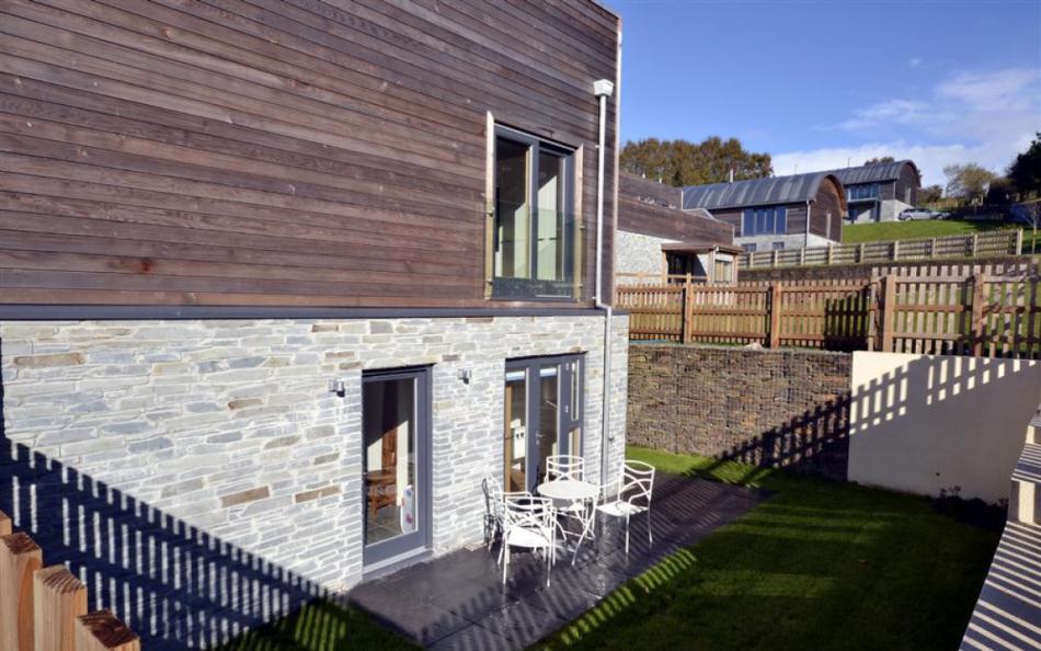 The exterior at Talland 17 showing the patio