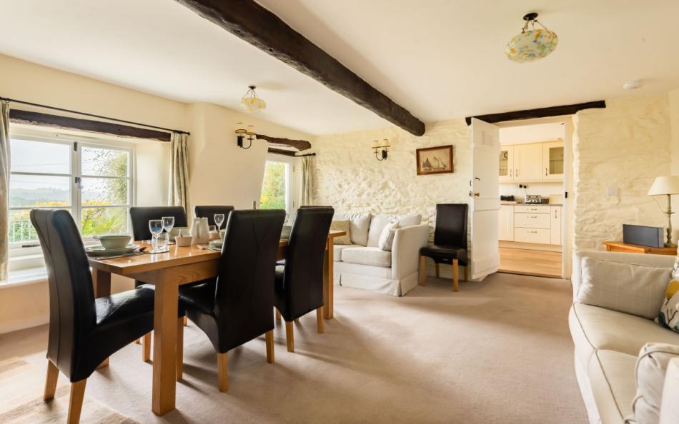The dining room with sofas at Dower House