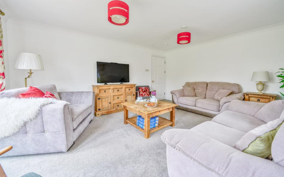 wider ciew of the lounge at Beech Lodge