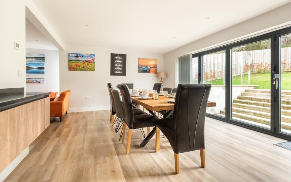 Dining table and chairs to seat 10