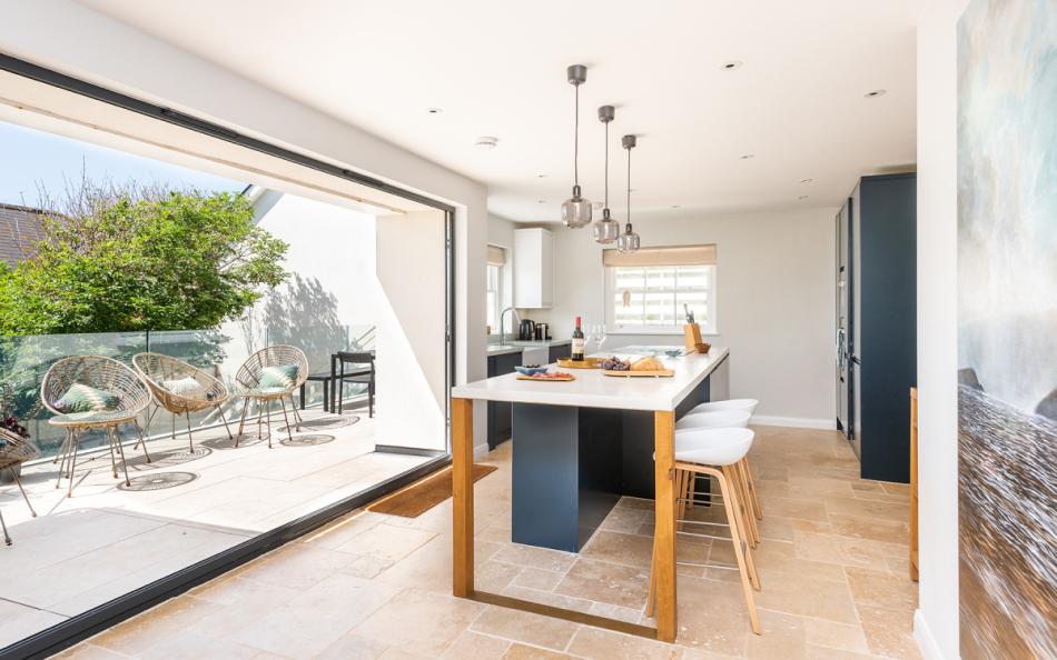 The stunning open plan kitchen with balcony.