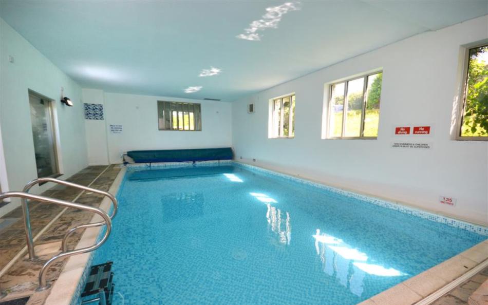 The heated indoor swimming pool at Court Barton Loft