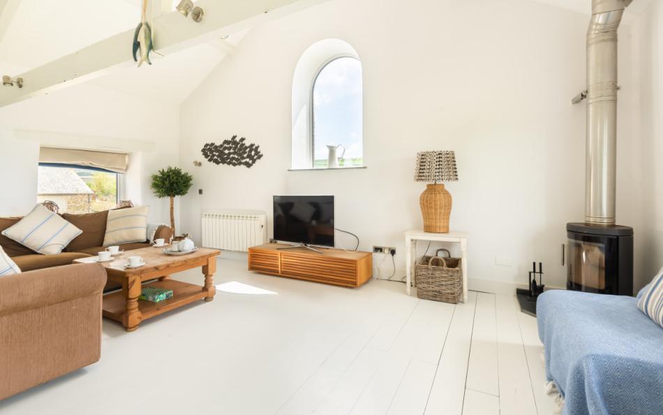 The sitting area with Smart TV and SKY at Court Barton Loft