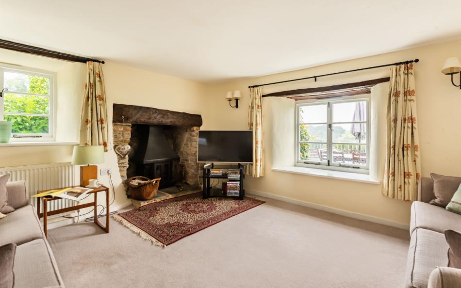 Wood burner in the sitting room at Dower House