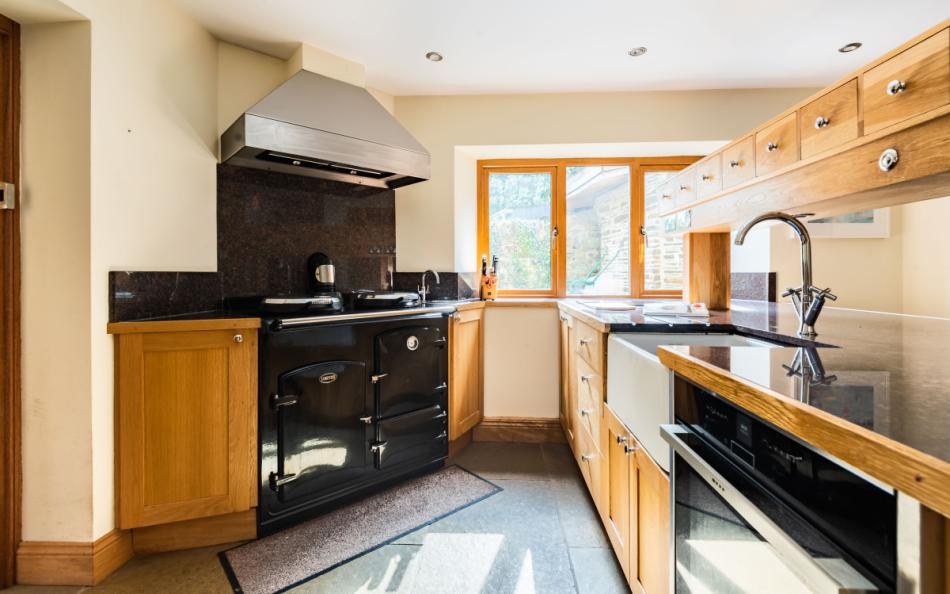 Kitchen with oven and Sandyford range cooker at Perchwood Shippon