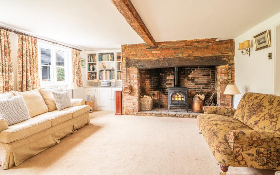 big lounge with woodburner at Moonfleet Cottage