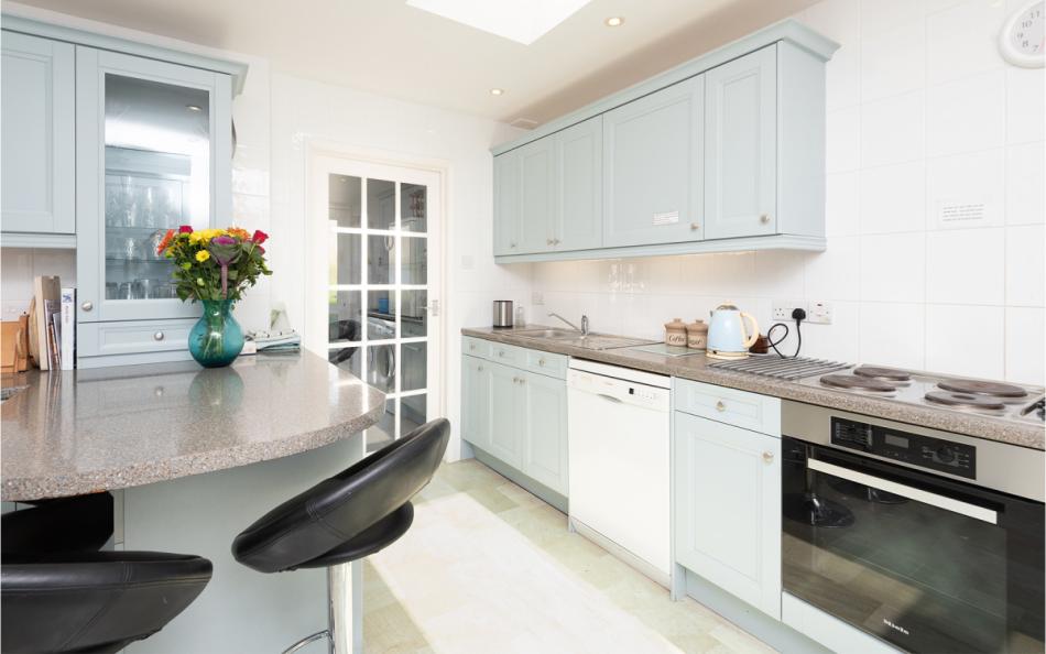 Well equipped kitchen at Devon House