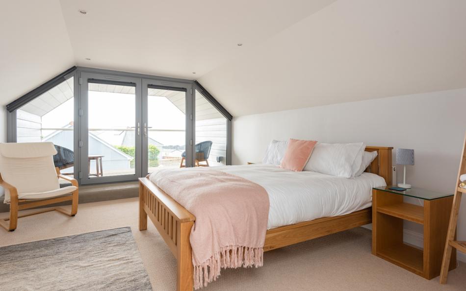 Master bedroom with balcony at Wavelet 