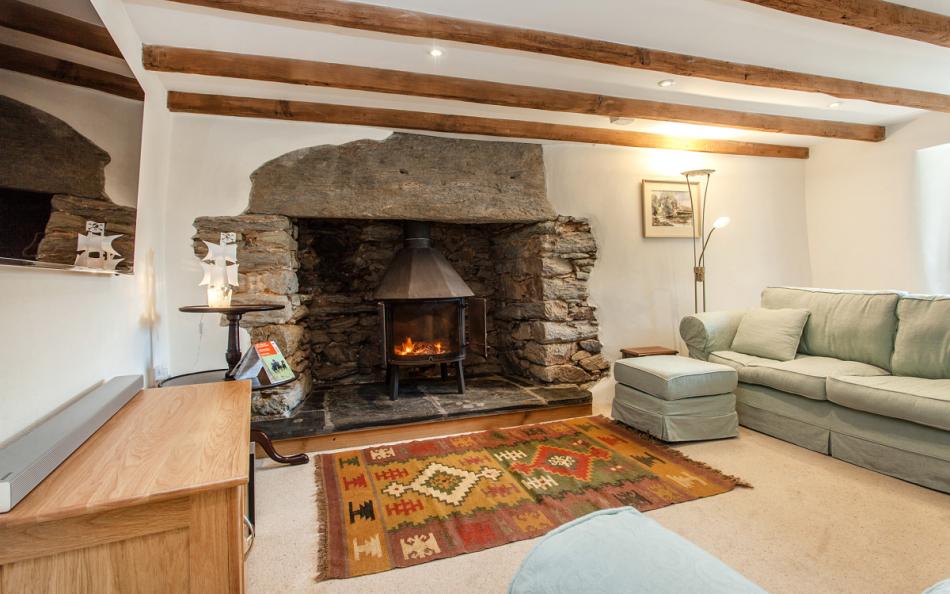 Large lounging area with log burner and 4K UHD TV at Locks Farm 