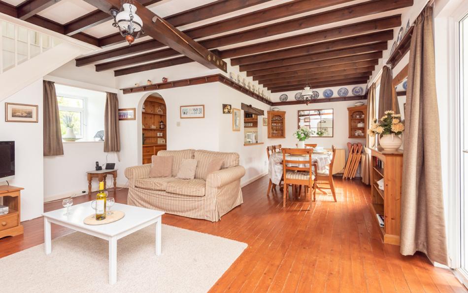 large living space next to the kitchen at Orchard View 
