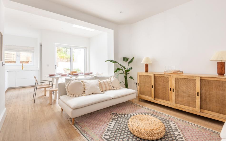 Open plan sitting room with  contemporary soft furnishing at Craiglands