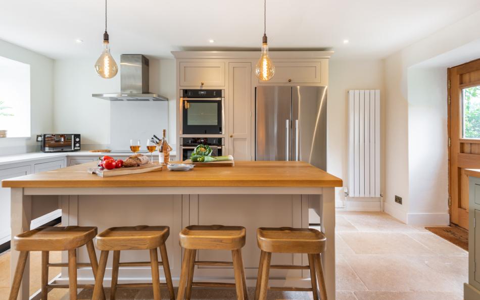 Kitchen island with 4 stools at Blackness Barn