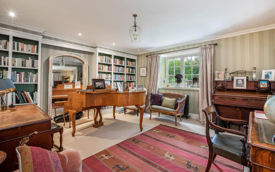 The drawing room with grand piano at Dunstone Farm